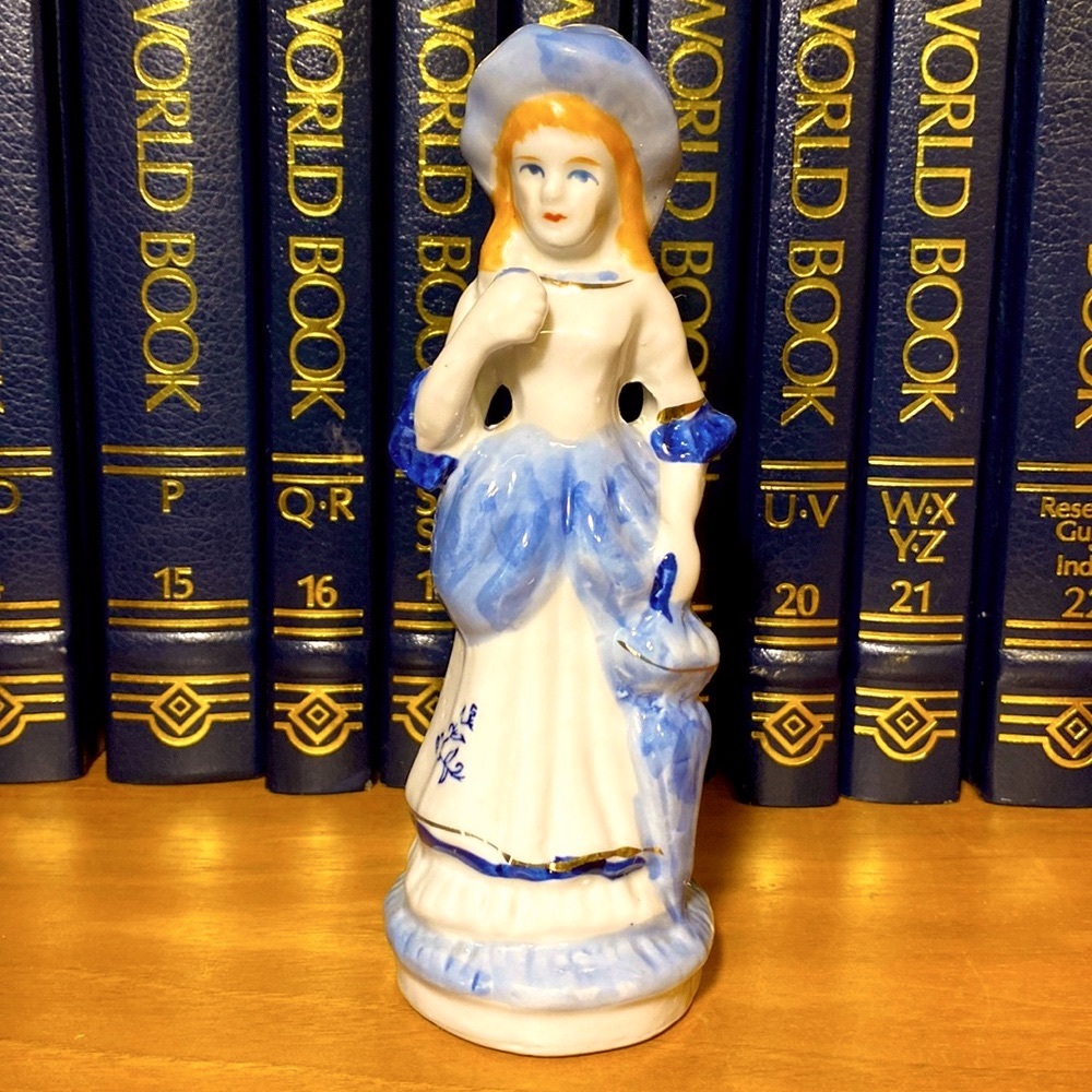 Porcelain Figurine: Woman In White & Blue Trimmed In Gold